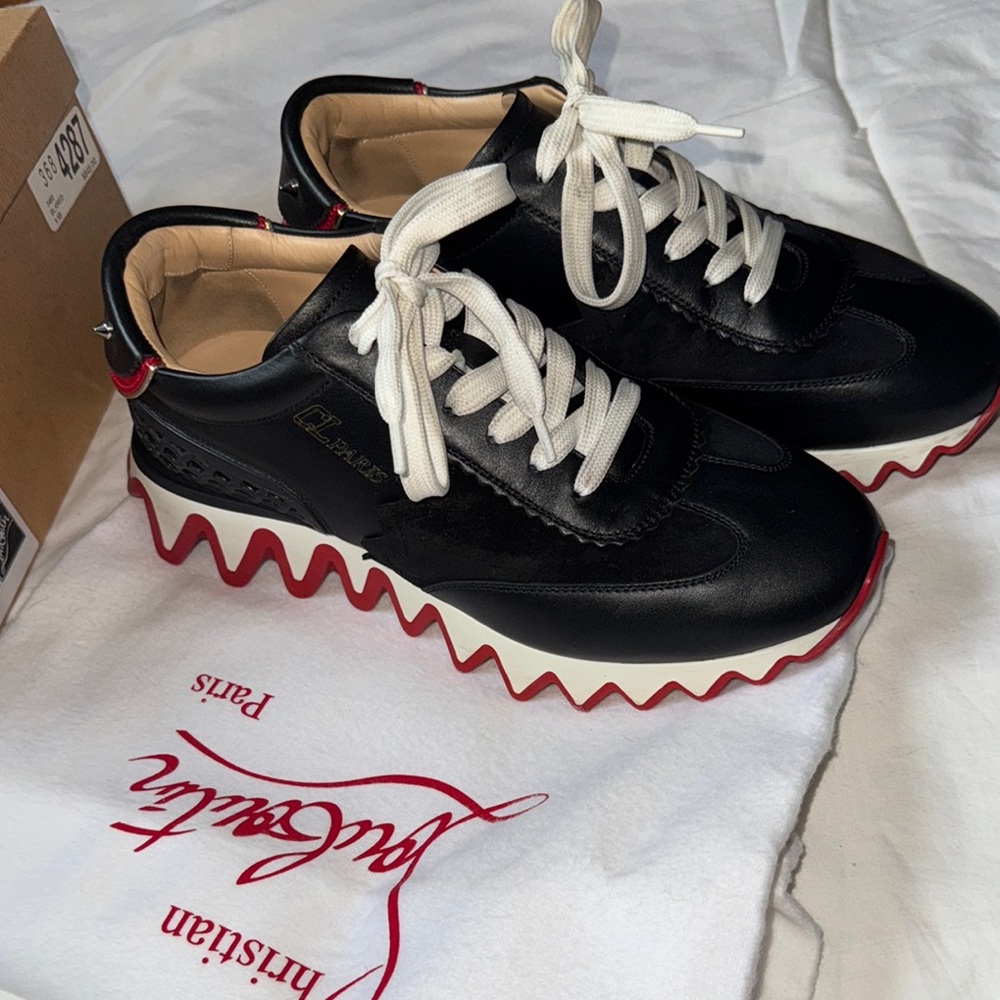 Christian Louboutin Black Sneakers with Zigzag Red Soles